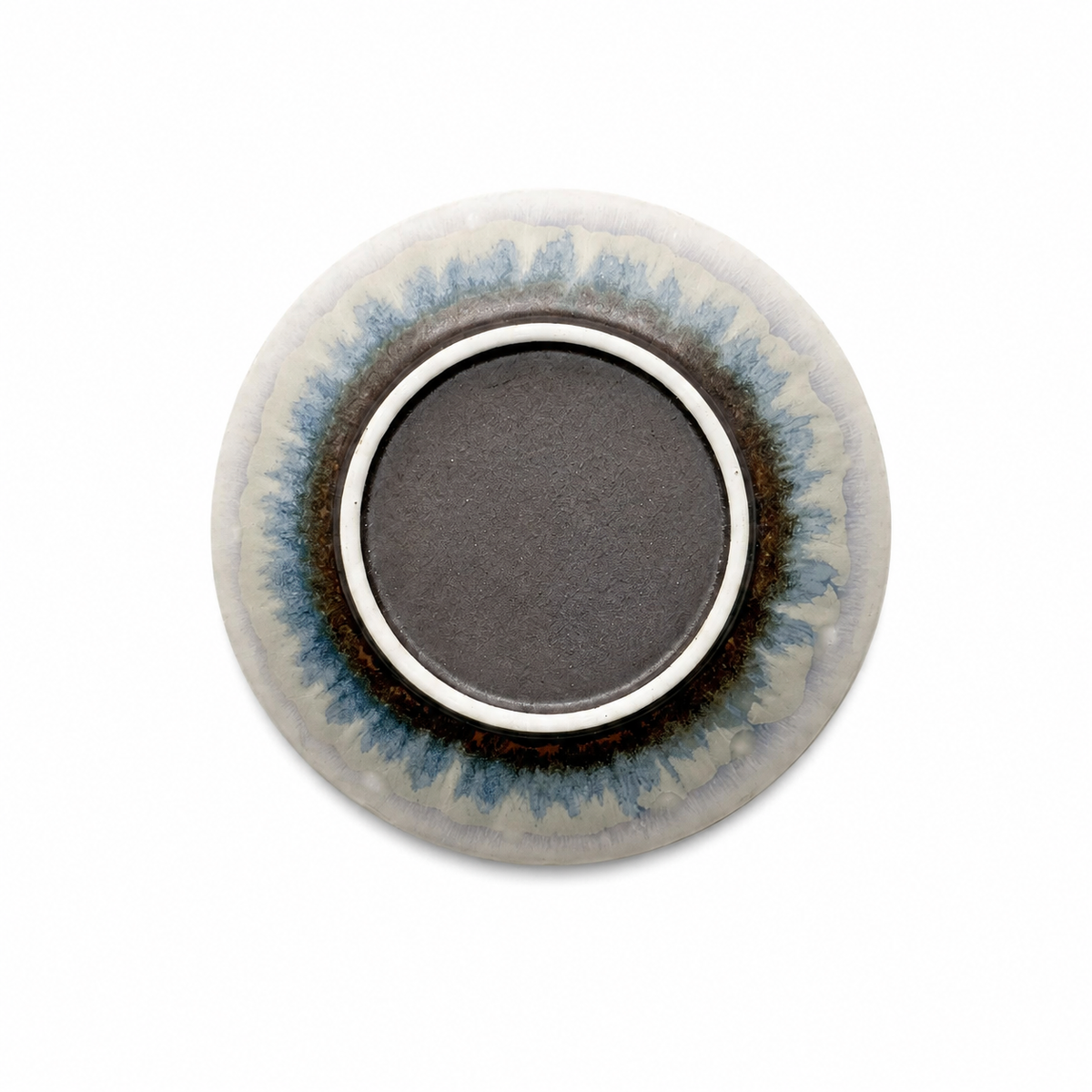Handmade Kiln-Transformed Glaze Saucer — underside detail on white background